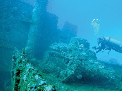 best place for scuba divers to explore sunk warships and planes